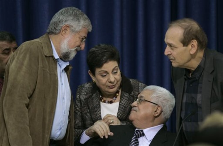 From right, Yasser Abed-Rabbo, a top official of the Palestine Liberation Organization, Palestinian president Mahmoud Abbas, Hanan Ashrawi, a senior PLO member and Israeli former general and ex-Labor party leader Amram Mitzna talk as they attend a meeting in the West Bank city of Ramallah on Sunday.